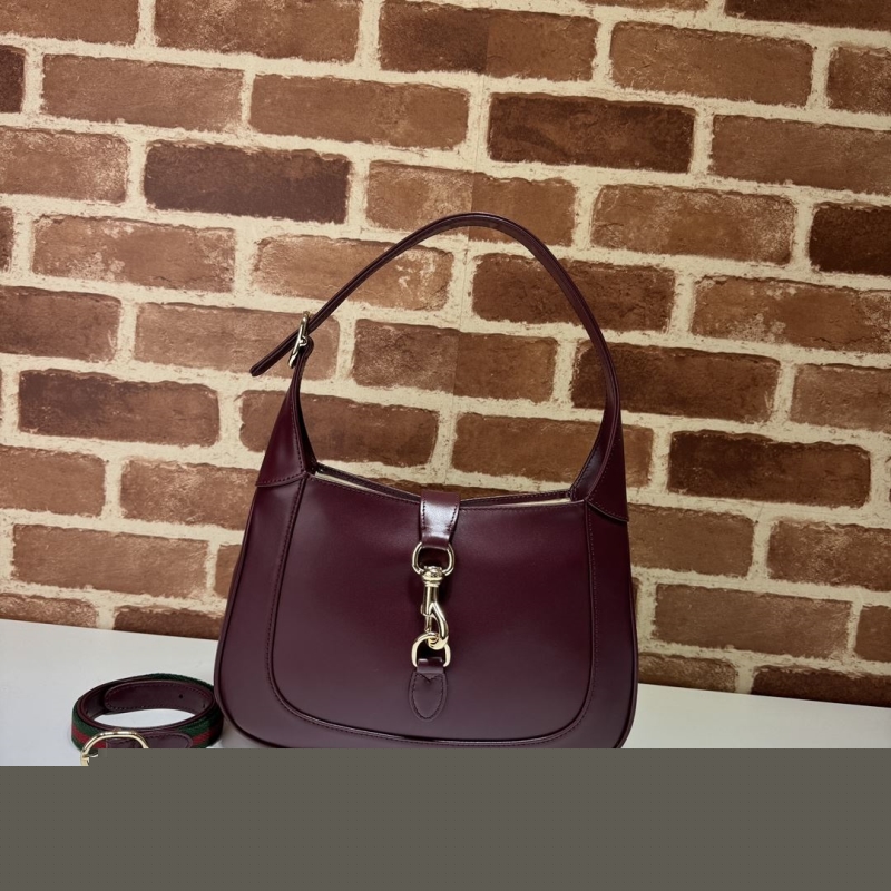 G*u*i top handle bags